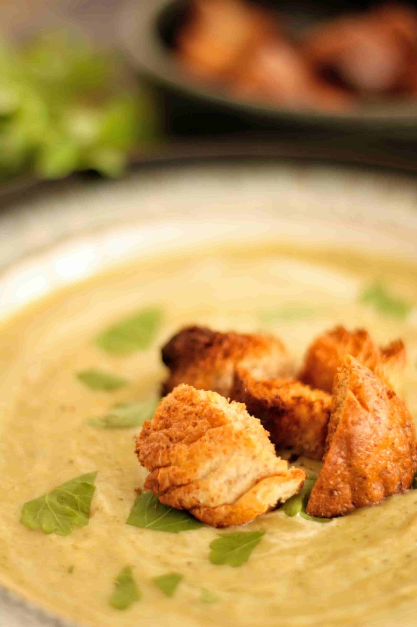 Healthy wholemeal croutons on broccoli and stilton soup
