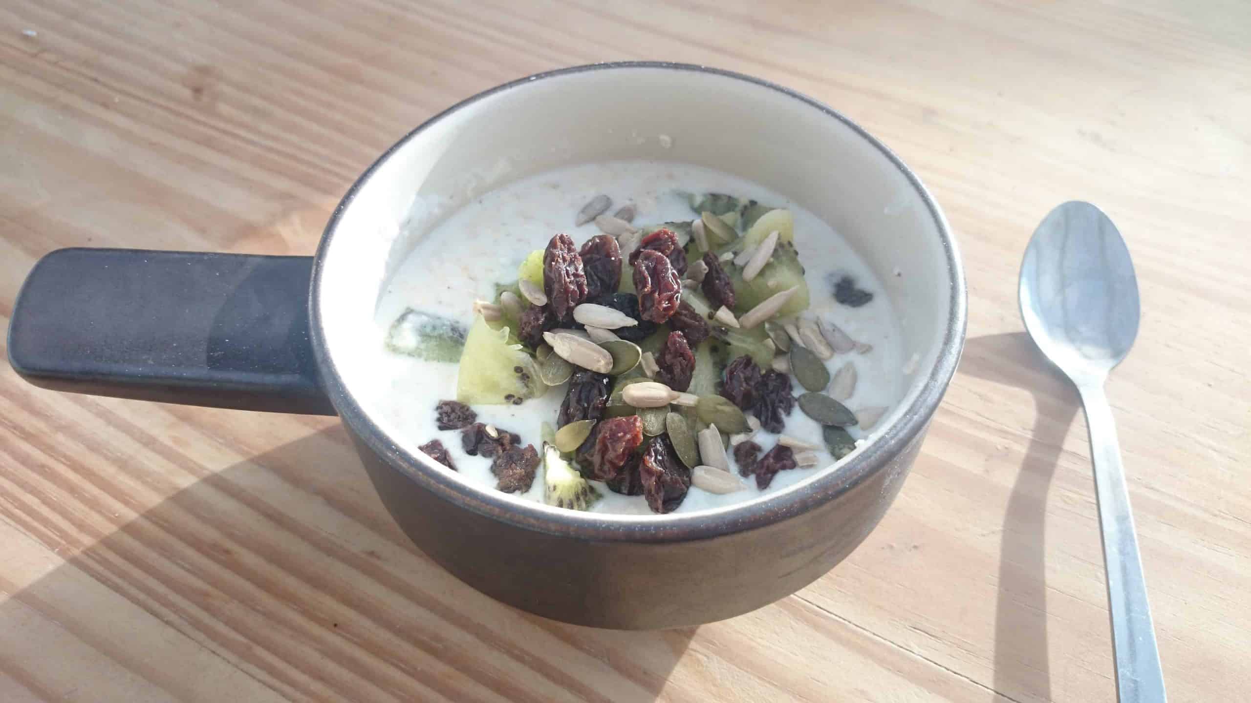 Slimming World Bircher Muesli in a small bowl with handle and silver spoon