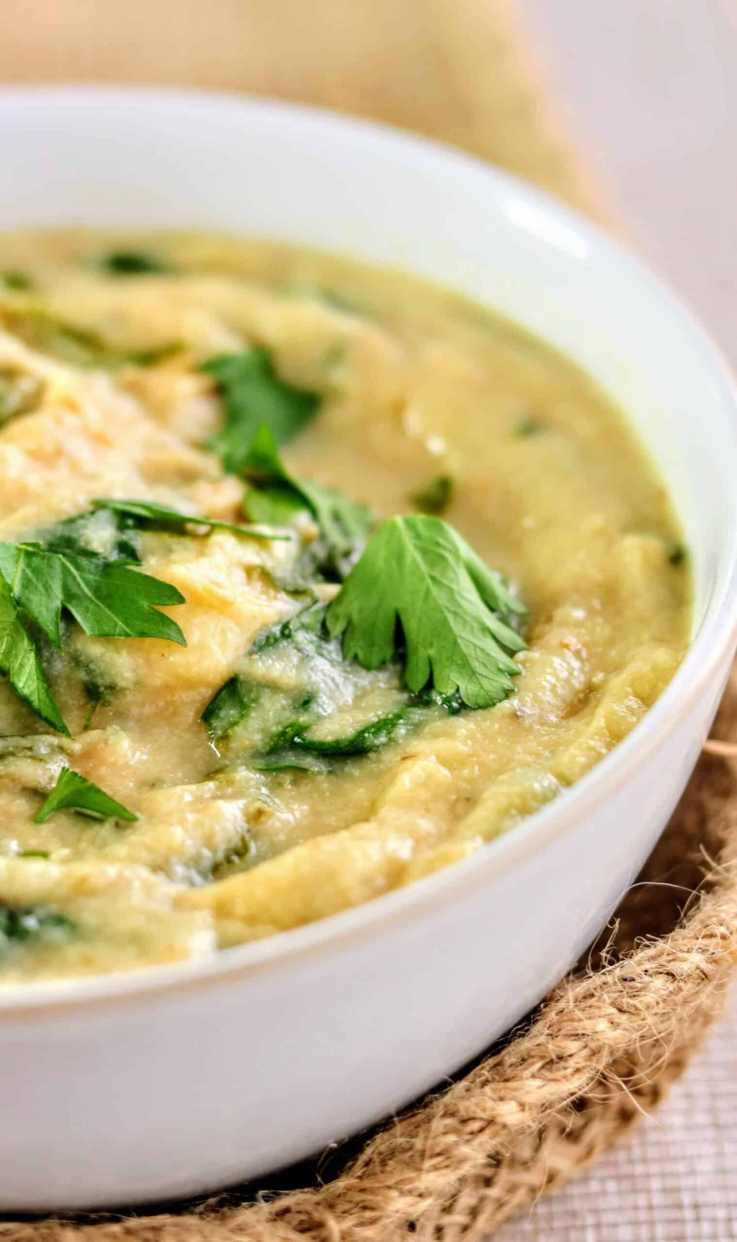 Close up of Greek Slimming World Roast Cauliflower, Cumin & Lemon Soup with fresh parsley