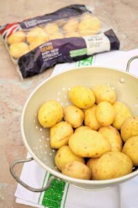 Slimming World Syn Free Hasselback Garlic & Cheese Baby Potatoes prep