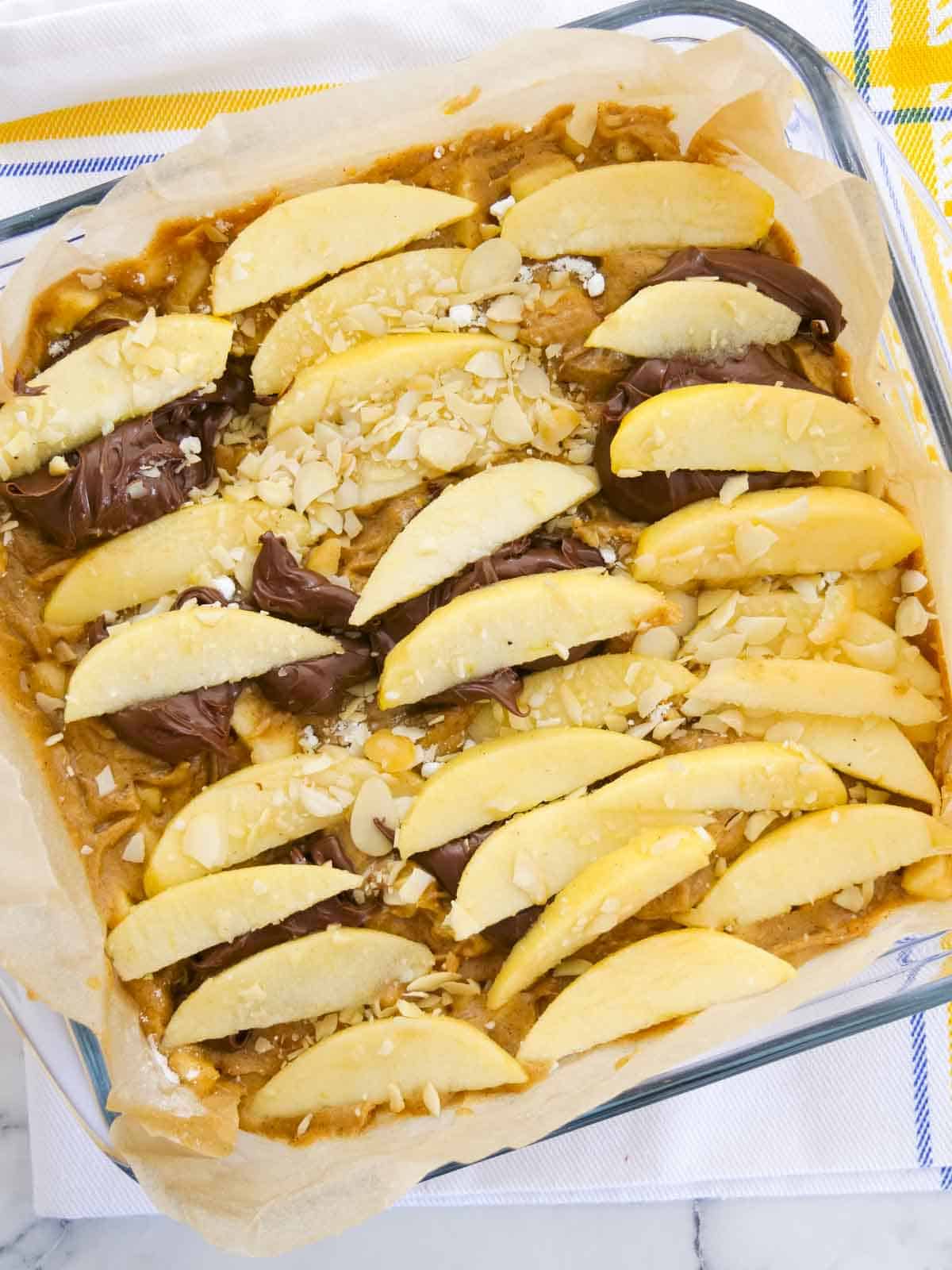 apple coffee cake in a baking dish before going in the oven