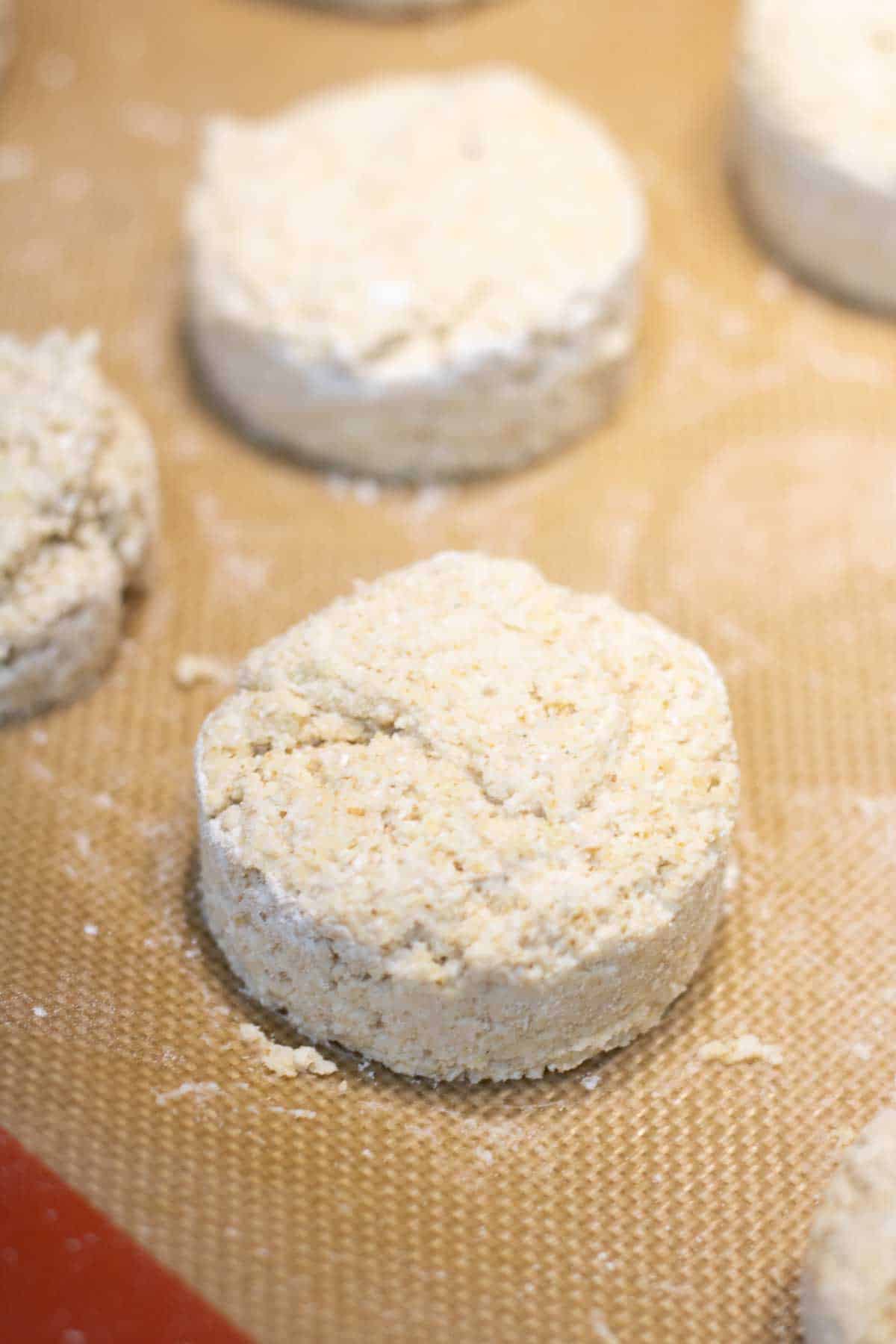 oat flour and lemonade scones on a silicone baking mat before going in the oven