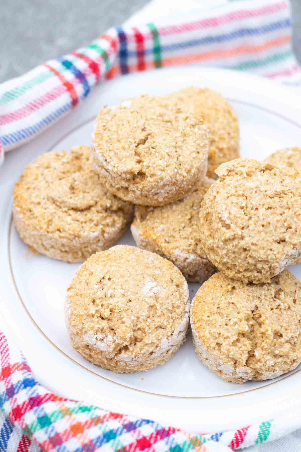 Stack of fat free cottage cheese and oatmeal scones on a white plate