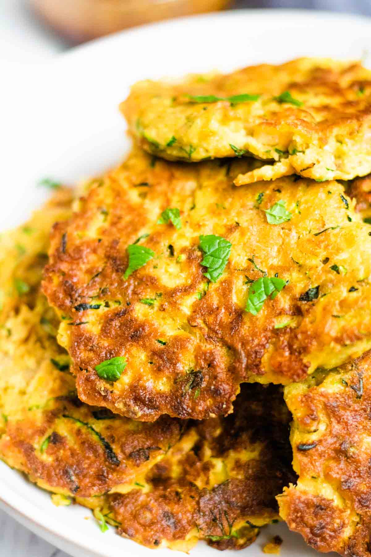 Stack of vegetable fritters with prawns with fresh mint for Keto or Slimming World diets