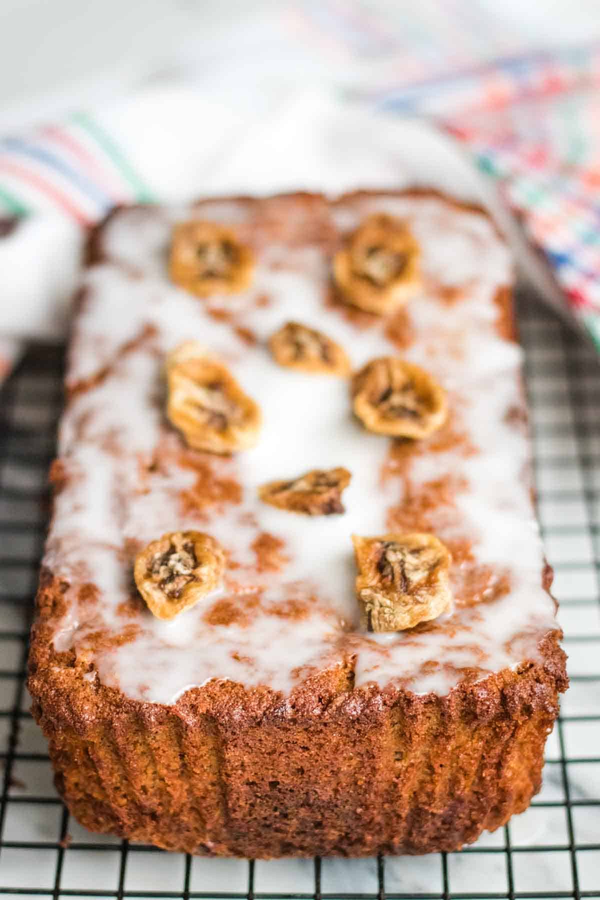 Close up of a freshly baked Gluten Free buckwheat banana bread on a cooling rack