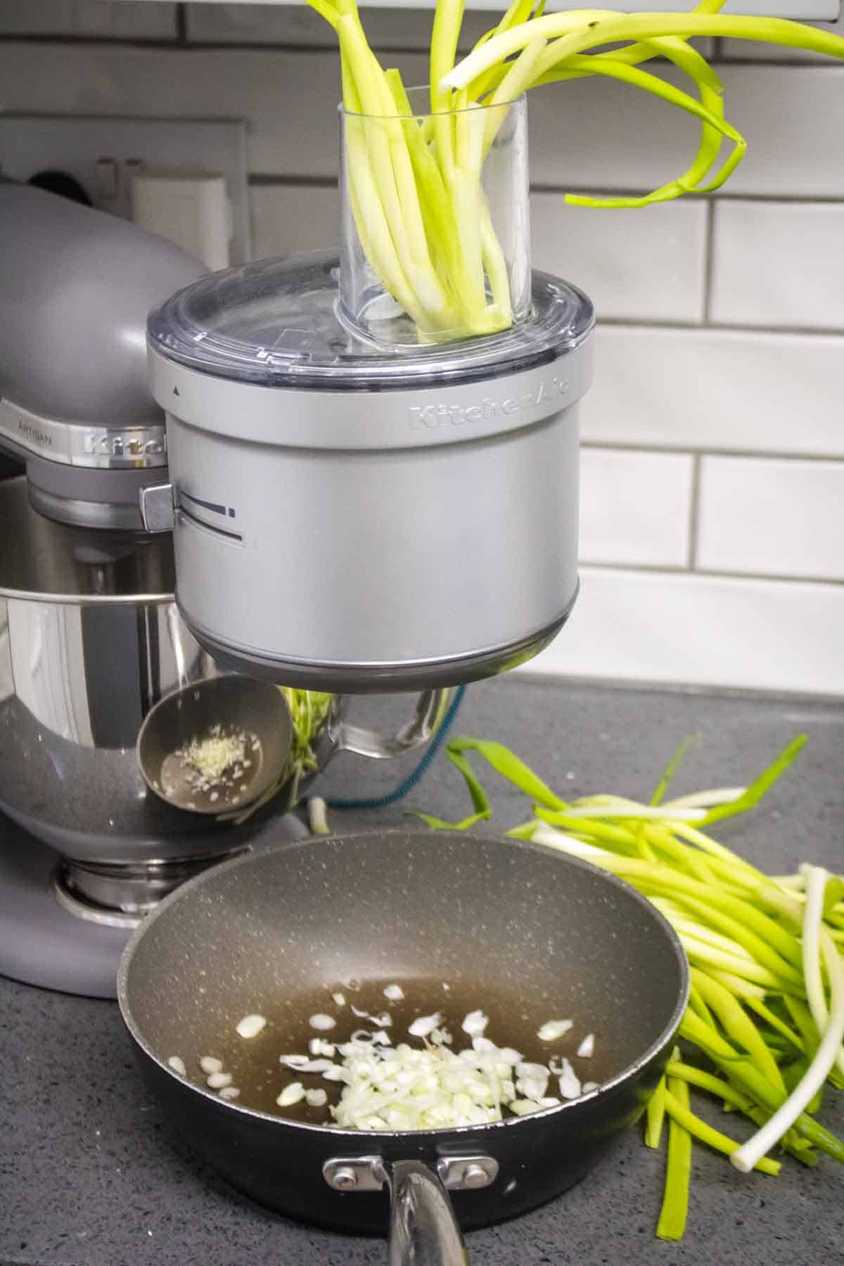 Kitchen aid mixer food processor attachment to shred spring onions easily straight into a frying pan