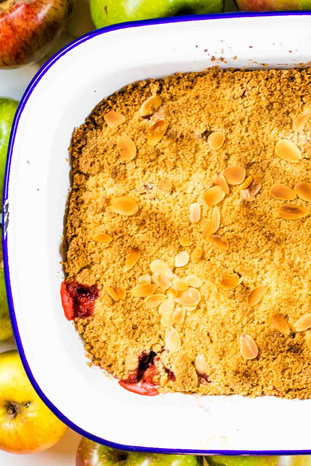 baked apple and strawberry crumble recipe in a Falconware enamel dish