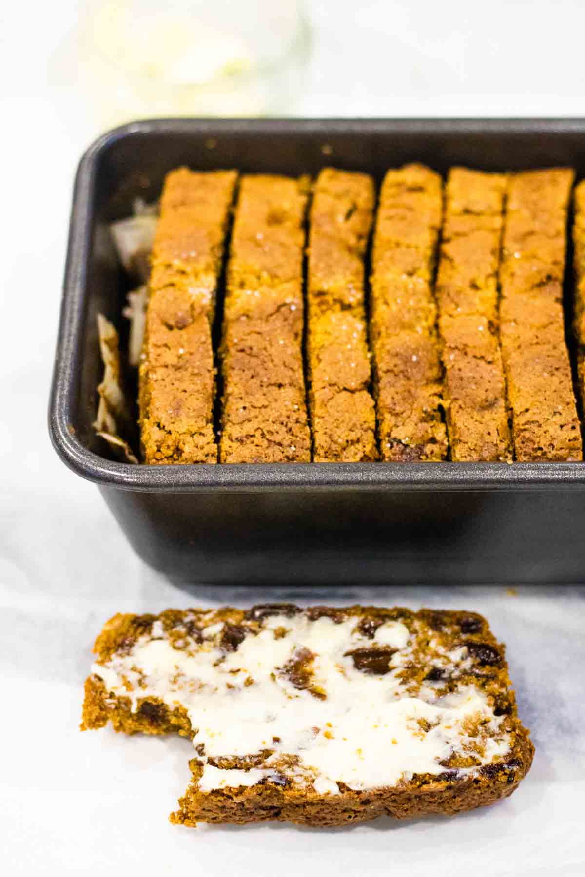 Close up of sliced easy tea brack in a 2lb loaf pan/tin