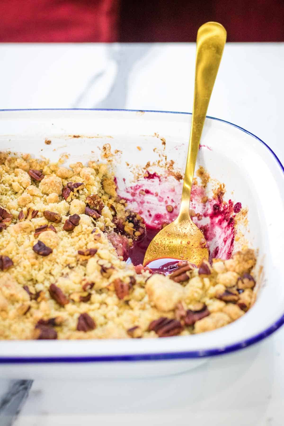 baked pear with blueberries in a Falcon enamel baking dish