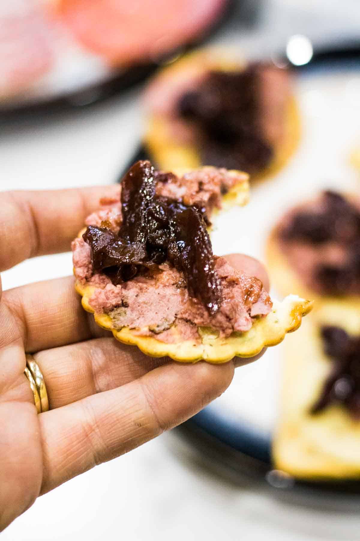 spiced red cabbage on crackers with pate