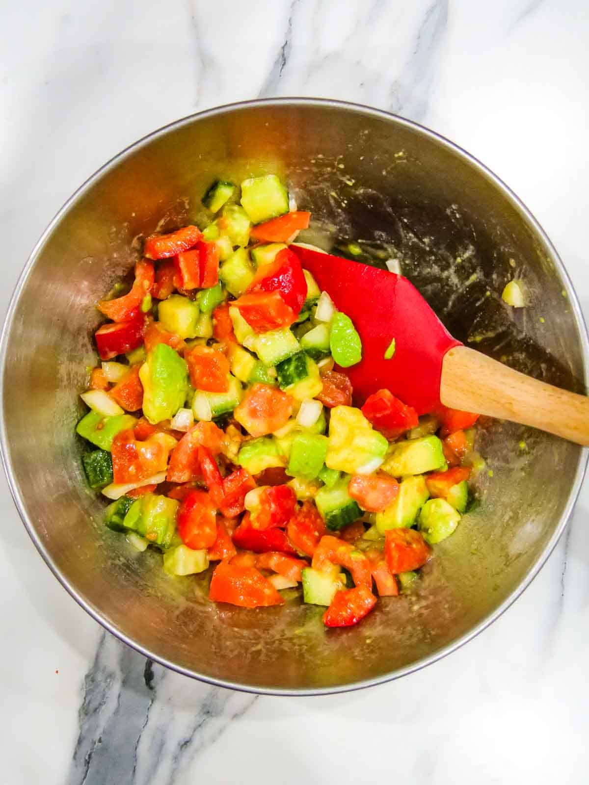 bowl full of pico de gallo Mexican salad