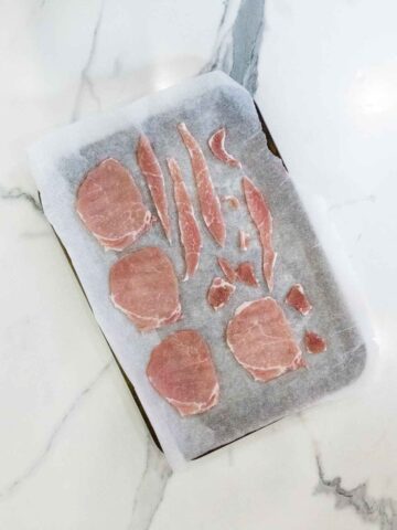 lean bacon on baking paper on a baking tray