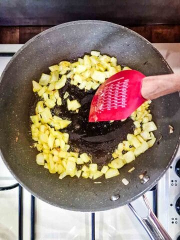 fryiing onions in a pan