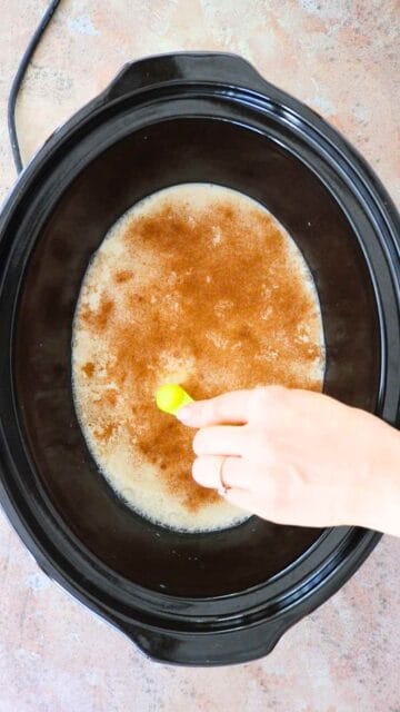 cinnamon, vanilla extract and sugar being added to uncooked rice pudding mixture