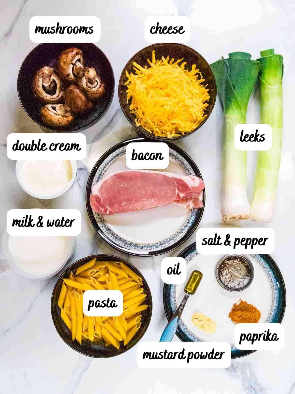 labelled ingredients for cheese and bacon pasta bake
