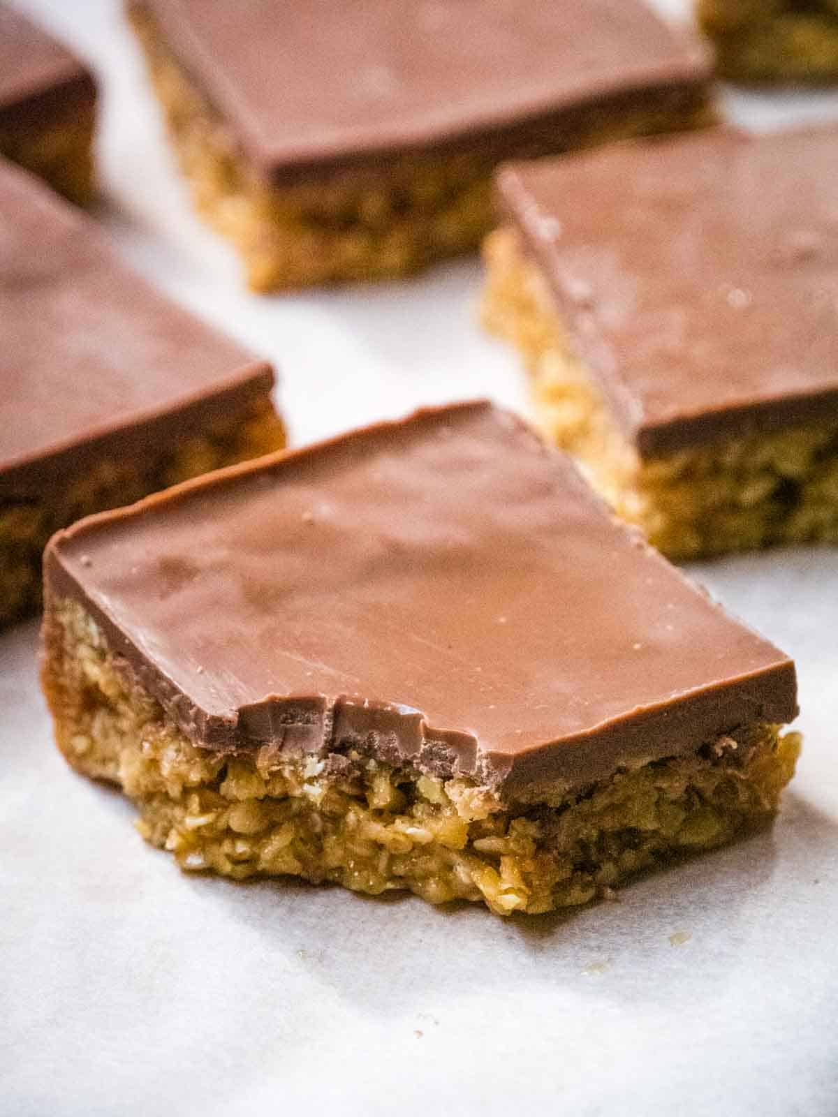 partially eaten flapjack with chocolate covering