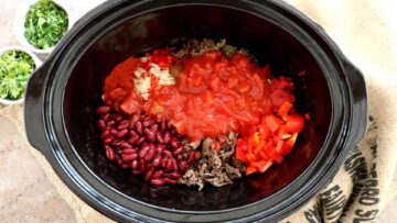 chilli con carne ingredients in a slow cooker