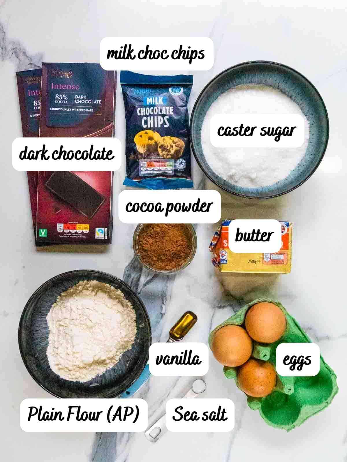 labelled main ingredients for happy birthday chocolate brownie cake