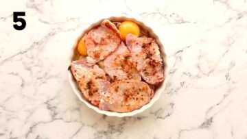 lean bacon layer on top of whole eggs and onions