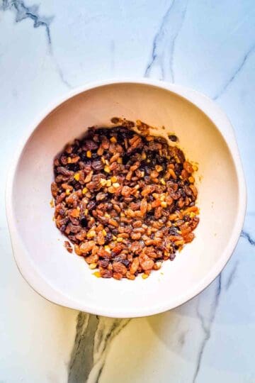 soaked tea and dried fruit the morning after in a large mixing bowl