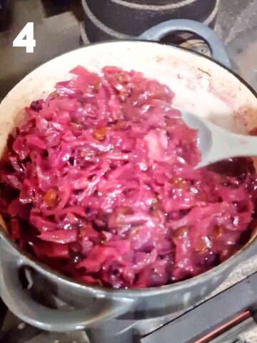 person stirring fruity slow cooker red cabbage