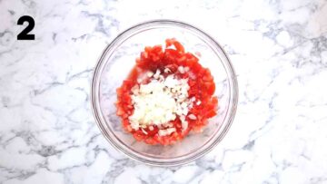 onions, vinegar, salt and sweetener in a large bowl with diced fresh tomatoes to make salsa