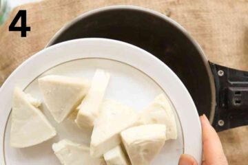 person adding laughing cow soft cheese triangles to a soup maker to blend into the soup