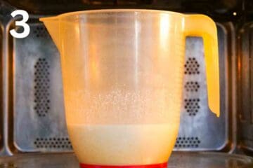 person microwaving milk and oat flour in the microwave in short 1 minute bursts
