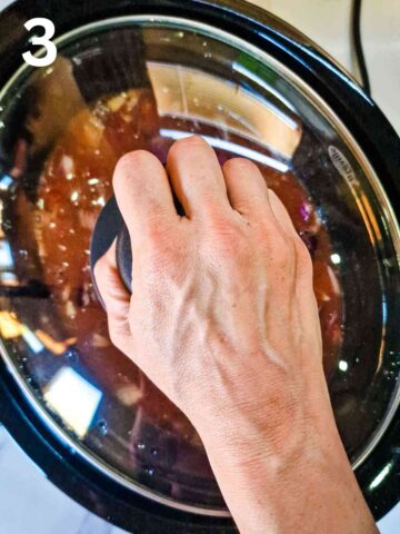 person placing lid on top of slow cooker