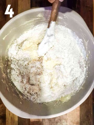 person stirring in self raising flour to form a Madeira cake mix