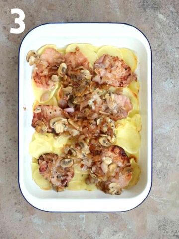 cooked bacon, onions and mushroom mixture scattered on potato slices for a full breakfast in one pan