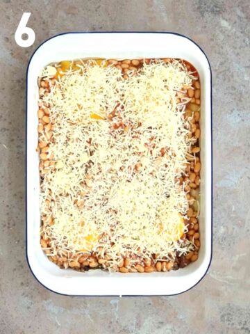 grated cheese sprinkled on egg and beans breakfast bake