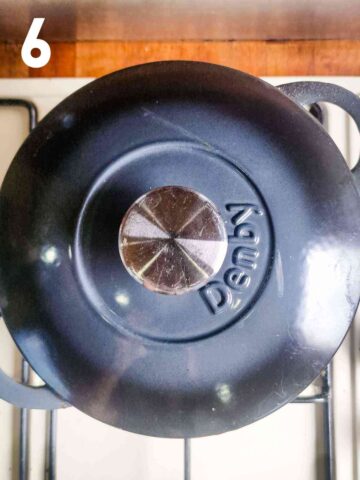 covered beef hotpot in Denby cast iron dish before cooking in oven