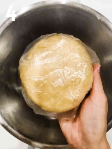large pastry dough ball in a plastic food bag before setting in the fridge