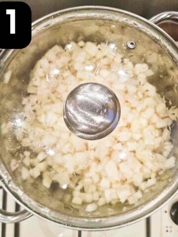 apples cooking in a covered saucepan